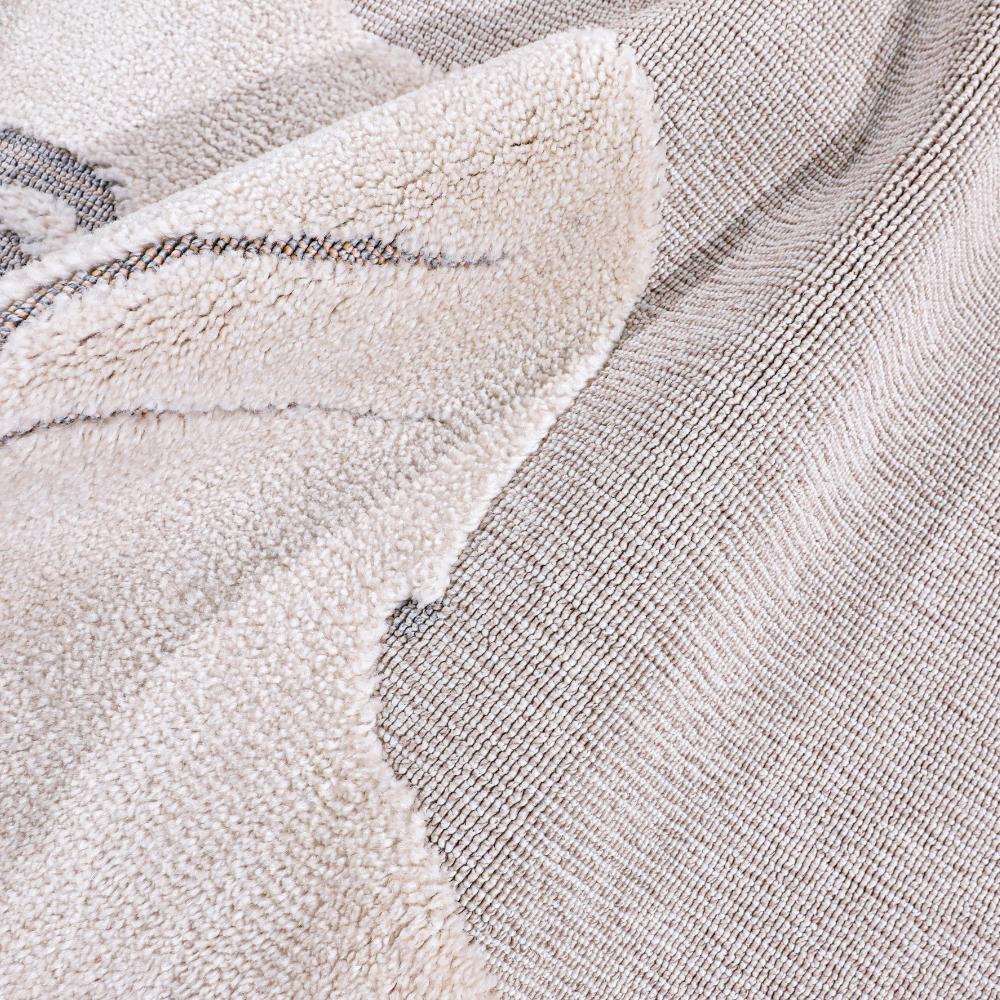 Soft textured Gentle Illusions Cat Woven Rug in neutral tones with playful cat design.