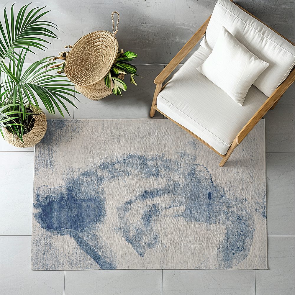 Mira Abstract Textured Rug in blue shades, stylish and machine-washable for modern decor.