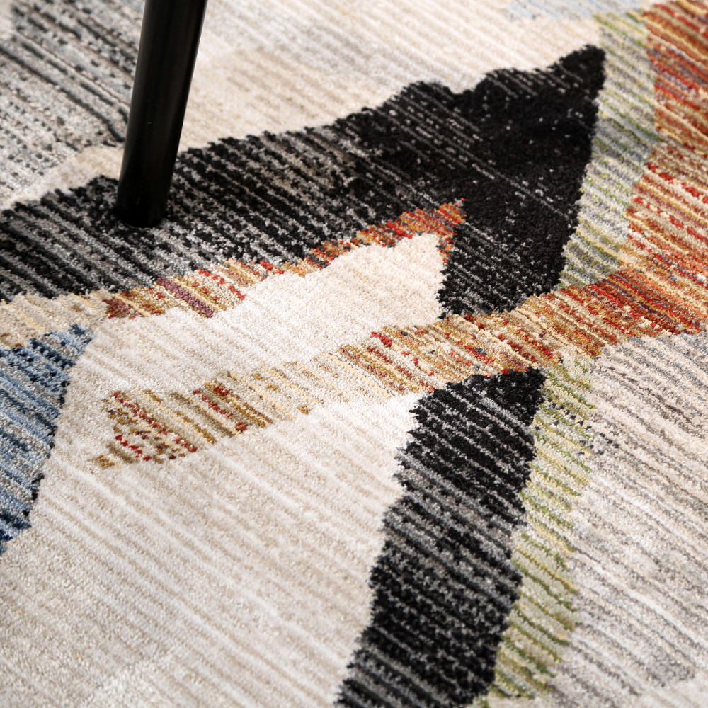 Stylish geometric rug with abstract diamond patterns in neutral colors