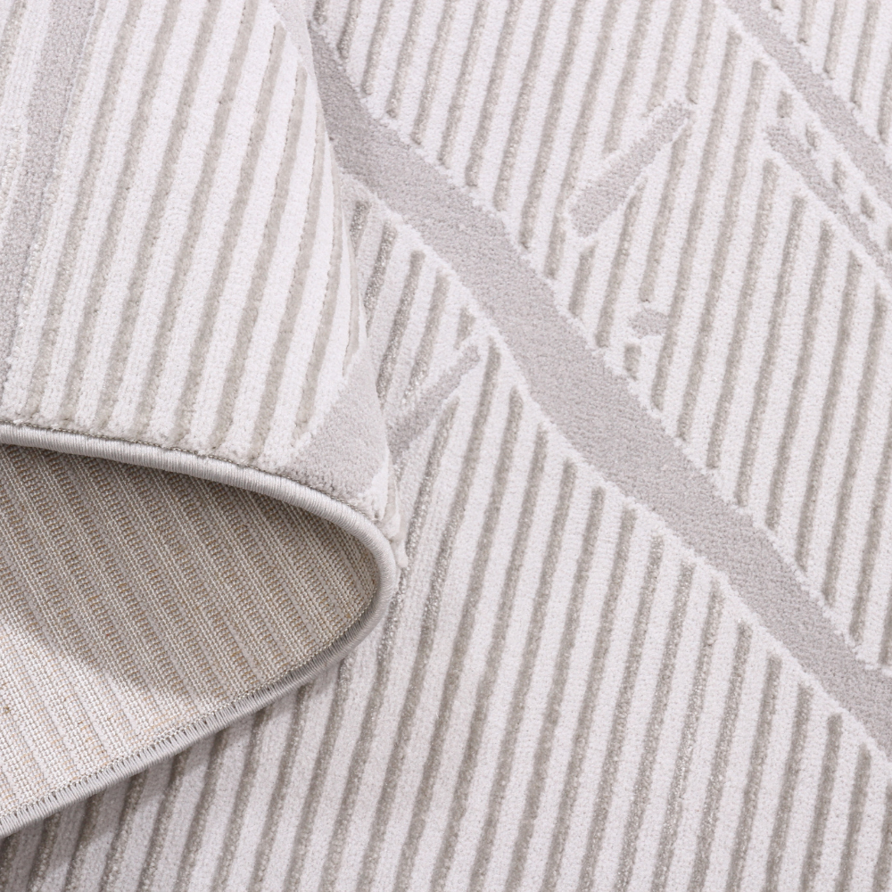 Beige Tess Strip rug with textured stripes for elegant home decor.