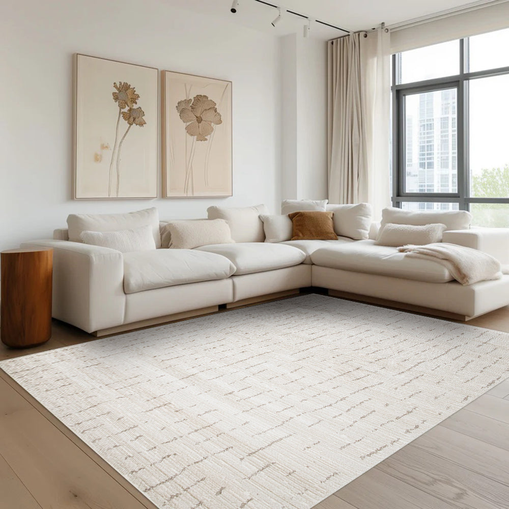 Iskander Stripe Textured Rug in cream enhancing a modern living room design.