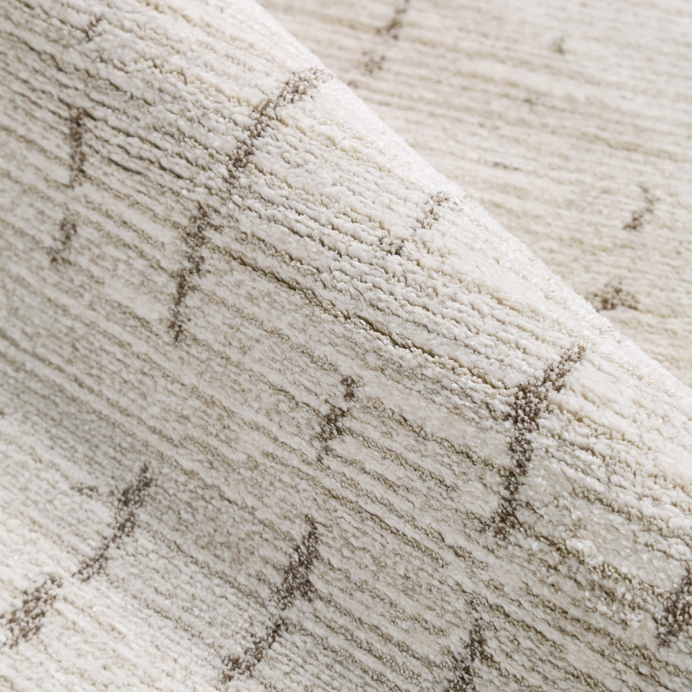 Iskander Stripe Textured Rug in cream with soft texture and subtle striped pattern.