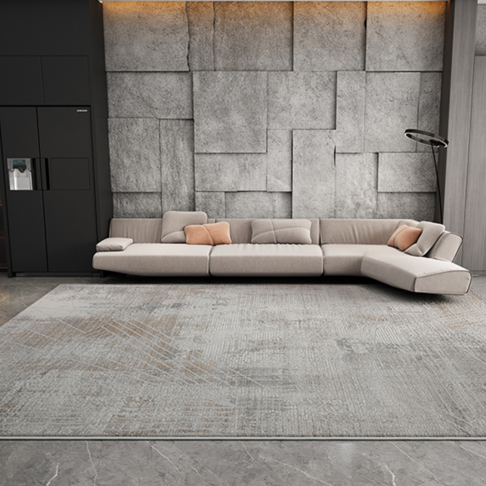 Modern living room with light gray sectional sofa and abstract washable rug