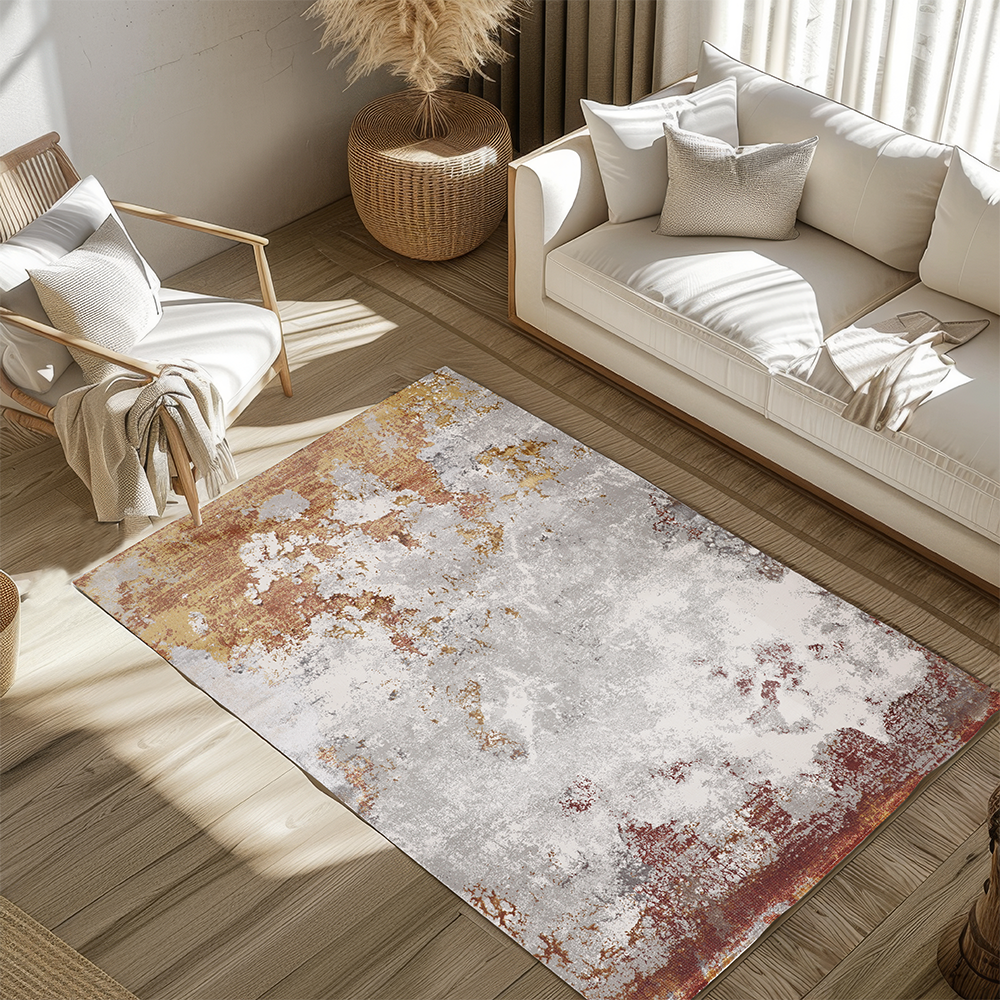 Ember Abstract Textured Rug with gray, red, and gold hues in modern living room